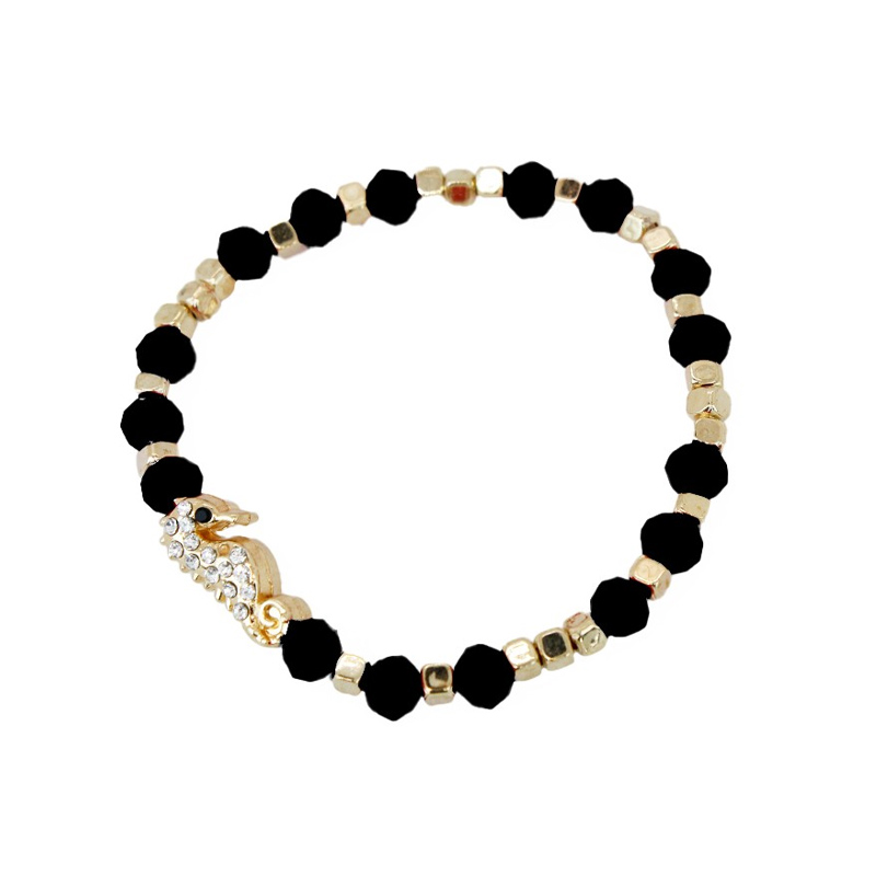Pulsera Elastica Negra y Dorada con Caballito de Mar con Strass