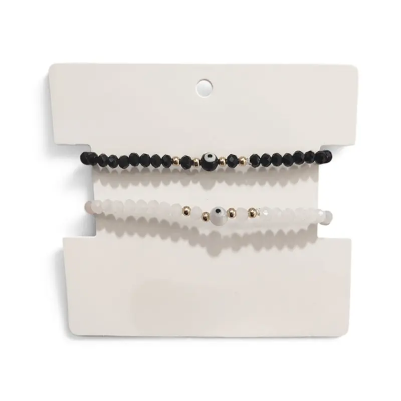 Set Pulseras Elasticas Blanca y Negra con Ojo Turco