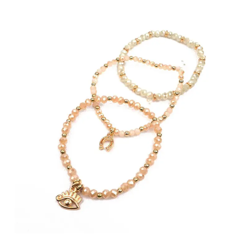 Set Tres Pulseras Elasticas Natural con Dijes Dorados
