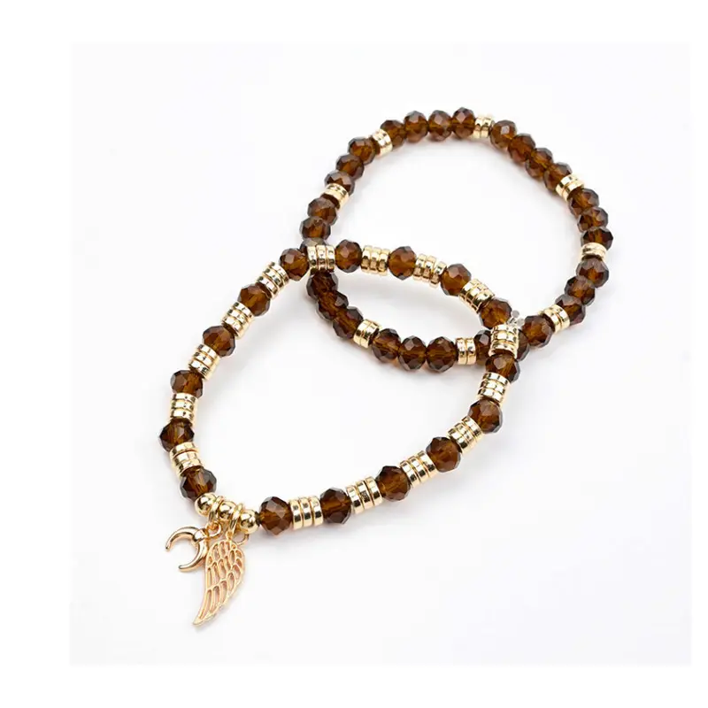 Set Pulseras Elasticas Marrones con Dijes Dorados Ala y Estrella