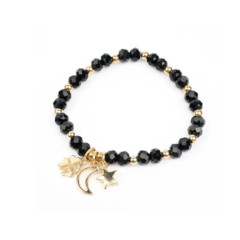 Pulsera Elastica Negra con Dijes Dorados Luna, Trebol y Estrella 
