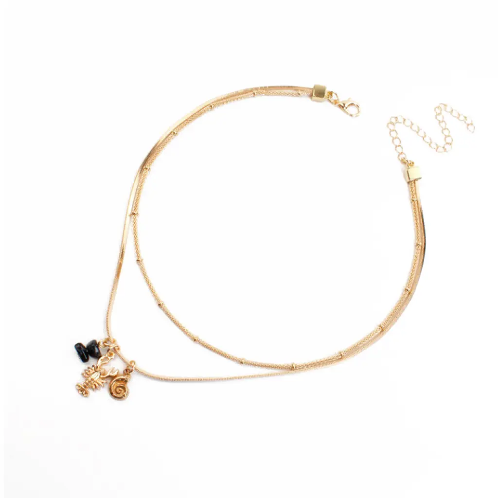 Collar Doble Cadena con Dijes Dorados Oceano