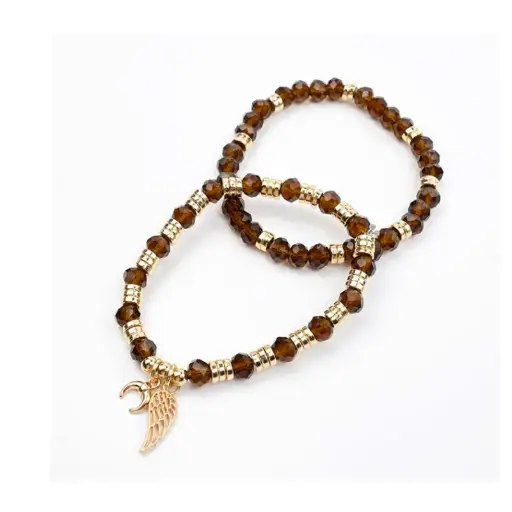 Set Pulseras Elasticas Marrones con Dijes Dorados Ala y Estrella